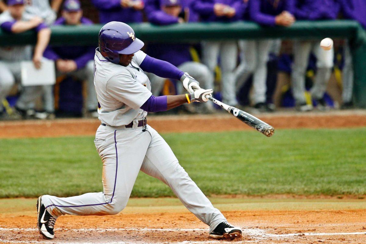 LSU outfielder Arby Fields hits a single against Kentucky on Saturday during the Tigers&#8217; 8-1 loss to the Wildcats in Lexington, Ky.