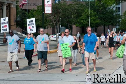 Husbands, sons and male friends &#8220;Walk a Mile in Her Shoes&#8221; for sexual abuse awareness Sunday afternoon at North Boulevard Town Square.