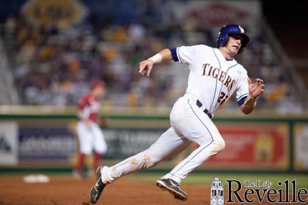 LSU sophomore catcher Ty Ross (26) rounds third base March 30 during the Tigers' 10-6 win against the University of Arkansas in Alex Box Stadium.