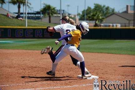 LSU freshman outfielder A.J. Andrews is sacrificed at first base Sunday during the Tigers&#8217; 1-0 loss to Ole Miss at Tiger Park.