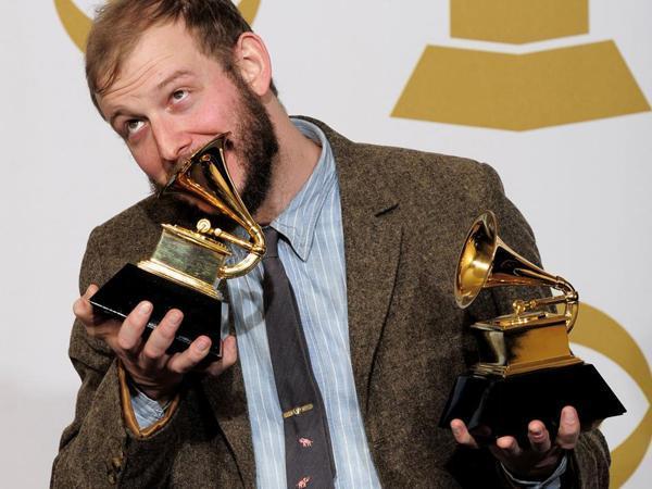 Justin Vernon, of Bon Iver, poses backstage with the award for best alternative music album for "Bon Iver" at the 54th annual Grammy Awards on Sunday, Feb. 12, 2012 in Los Angeles.