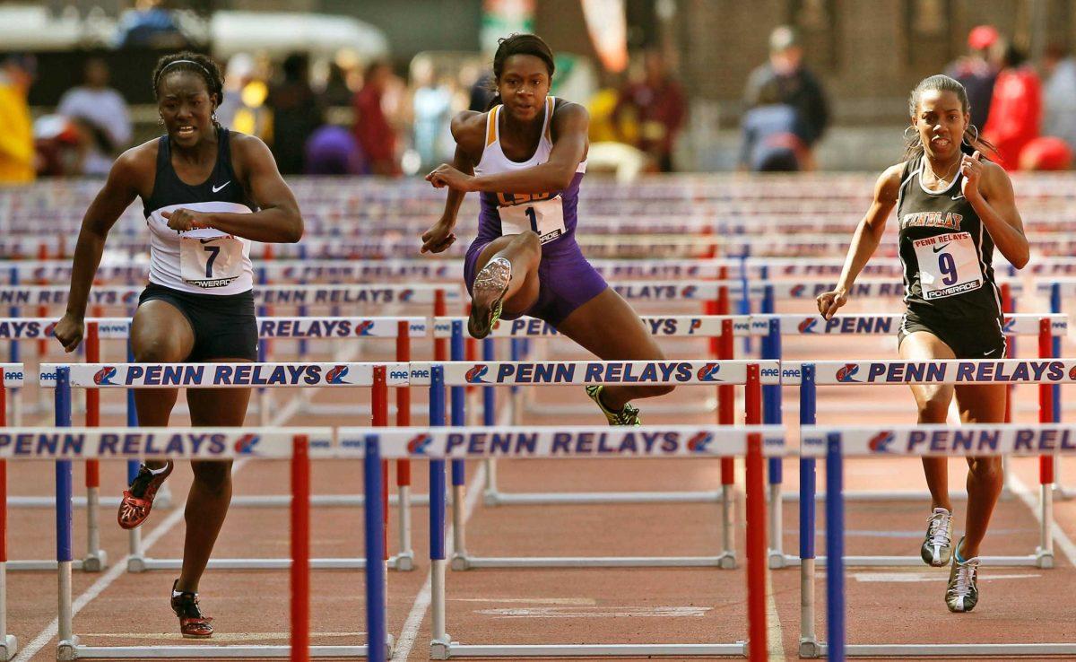 Villanova&#8217;s Shericka Ward (left) and LSU&#8217;s Jasmin Stowers (right) compete in the women&#8217;s 100-meter hurdles Friday during the Penn Relays athletics meet in Philadelphia. .