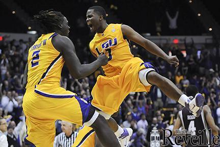 LSU sophomore guard Andre Stringer celebrates Tuesday with freshman forward Johnny O&#8217;Bryant III after LSU&#8217;s 69-67 overtime win against Mississippi State in the PMAC.