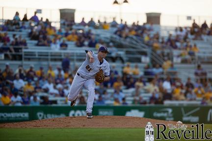 LSU sophomore pitcher Joe Broussard throws to get a runner out at first in Tuesday&#8217;s win against Tulane, 9-5.