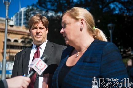 Former LSU School of Veterinary Medicine employee Marc Boudreaux and his defense attorney speak to the media outside of the Baton Rouge courthouse.