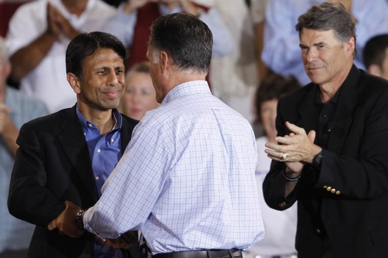 Presidential candidate Mitt Romney greets La. Gov. Bobby Jindal in Basalt, Colo., on Aug. 2. At right is Texas Gov. Rick Perry.
 