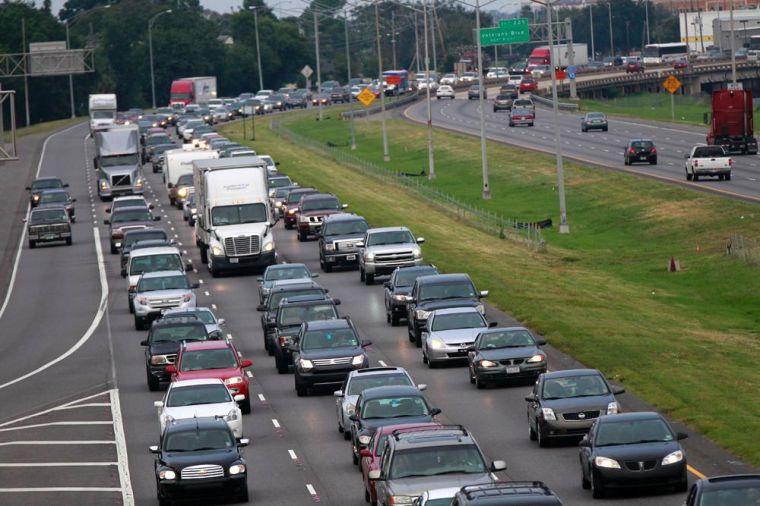 A line of traffic extends down Interstate 10 heading towards Baton Rouge, as many residents leave the New Orleans area in anticipation of tropical storm Isaac, which is expected to make landfall on the Louisiana coast as a hurricane, in Kenner, La., Monday, Aug. 27, 2012.