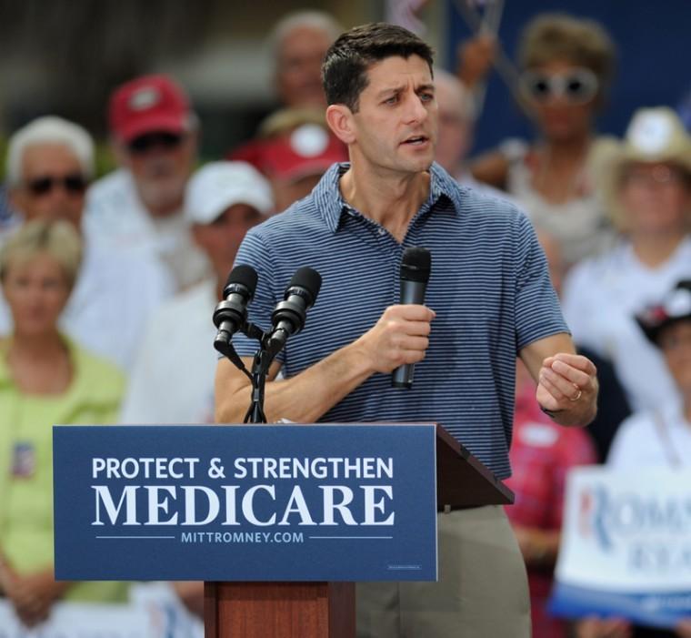 Vice presidential candidate Paul Ryan speaks to the crowd during a victory rally, Saturday, Aug. 18, 2012 at Lake Sumter Landing Market Square in The Villages, Fla. (AP Photo/Daily Sun, Bill Mitchell) LEESBURG; ORLANDO AND OCALA OUT
 