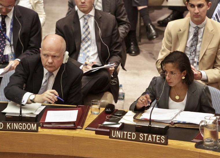 William Hague, left, U.K. Foreign Minister, and Susan Rice, U.S. Ambassador to the U.N., listens during a meeting on Syria in the United Nations Security Council on Thursday, Aug. 30, 2012. Turkey's foreign minister urged the Security Council on Thursday to set up a safe zone in Syria to protect thousands of civilians fleeing the civil war. (AP Photo/Bebeto Matthews)
 