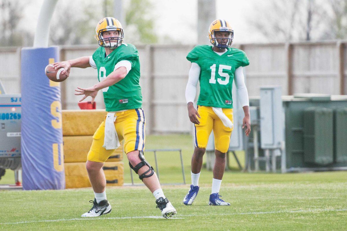 LSU junior quarterback Zach Mettenberger throws a pass March 6, 2012 during practice.