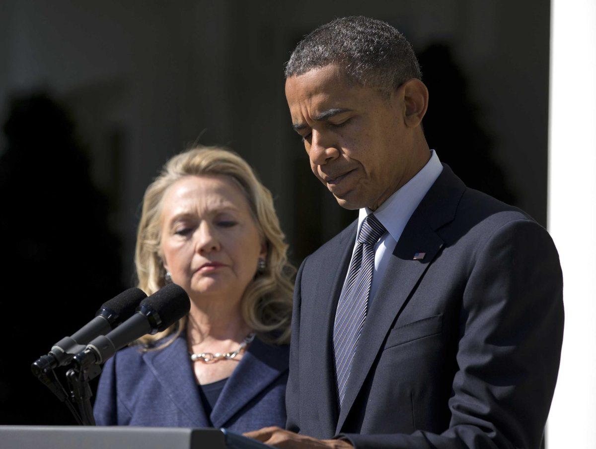 In this Sept. 12, 2012, photo, President Barack Obama, accompanied by Secretary of State Hillary Rodham Clinton, speaks in the Rose Garden of the White House in Washington, about the death of U.S. ambassador to Libya Christopher Stevens. His eye fixed firmly on securing a second term, Obama had hoped that the rest of the world would wait until after the election if it had to grow restless and demand his attention. The eruptions in the streets of the Arab world, inflamed by an anti-Muslim video made in the U.S., mean Obama can put it off no longer. The protests are testing the president&#8217;s foreign policy skills and giving voters a pre-election view of how he handles a crisis. (AP Photo/Evan Vucci)