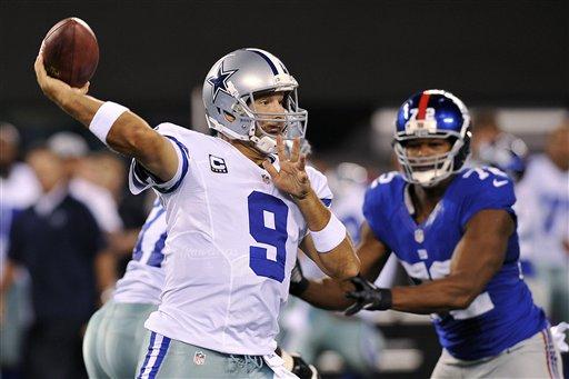 Dallas Cowboys quarterback Tony Romo (9) throws a pass during the first half of an NFL football game against the New York Giants, Wednesday, Sept. 5, 2012, in East Rutherford, N.J. (AP Photo/Bill Kostroun)
 