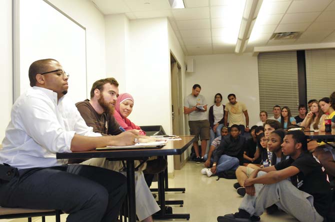 The panel speaks to the LSU community in West Hall Wednsday night about the recent Muslim protests and the movie trailer that may have incited these protests.
 