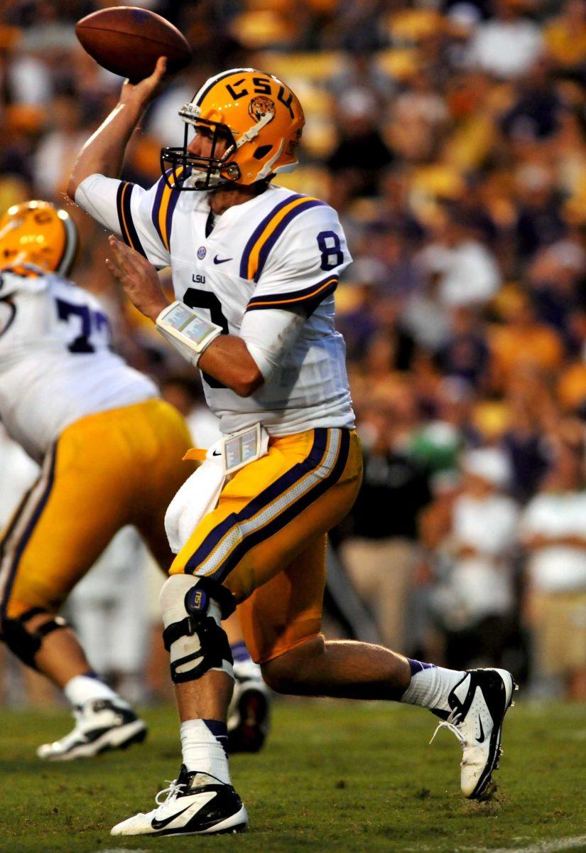 LSU junior quarterback Zach Mettenberger (8) throws for a completion Sept. 1 against North Texas. Mettenberger threw for 192 yards in the season opener.