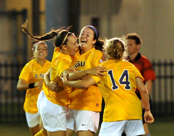 The Lady Tigers celebrate after Colby Maffei (center) scored her first career goal to give the Tigers a 1-0 lead over Memphis on Monday, Sept. 10, 2012.
 