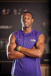 Armand Williams poses for a photo in the Wide Reciever's meeting room at the LSU Football Operations Facility.
 