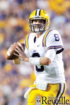 LSU junior quarterback Zach Mettenberger drops back to pass Saturday during the Tigers’ 41-3 victory against the Washington Huskies in Tiger Stadium. Mettenberger went 12-for-18 in his second start.