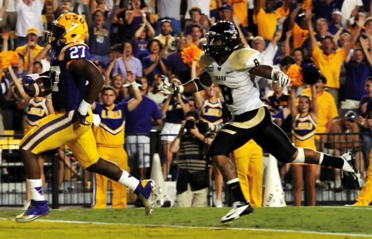 Sophomore running back Kenny Hilliard (27) runs in for a touchdown Saturday, September 15, 2012 during the Tigers' 63-14 win over Idaho in Tiger Stadium.
 