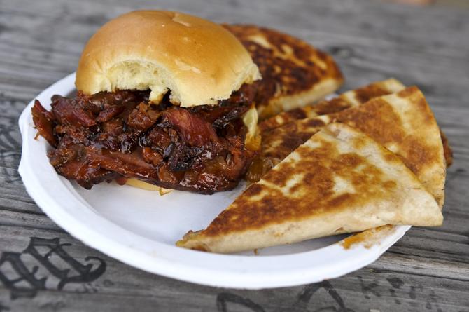 A barbecue brisket sandwich and a barbecue chicken quesadilla is served at Smokin Aces BBQ on Government St. The barbecue joint is set to open Oct. 1.
 