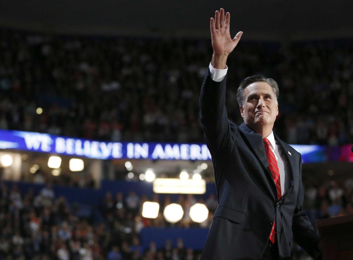 Republican presidential nominee Mitt Romney waves to delegates after speaking at the Republican National Convention in Tampa, Fla., on Thursday, Aug. 30, 2012. (AP Photo/Jae C. Hong)