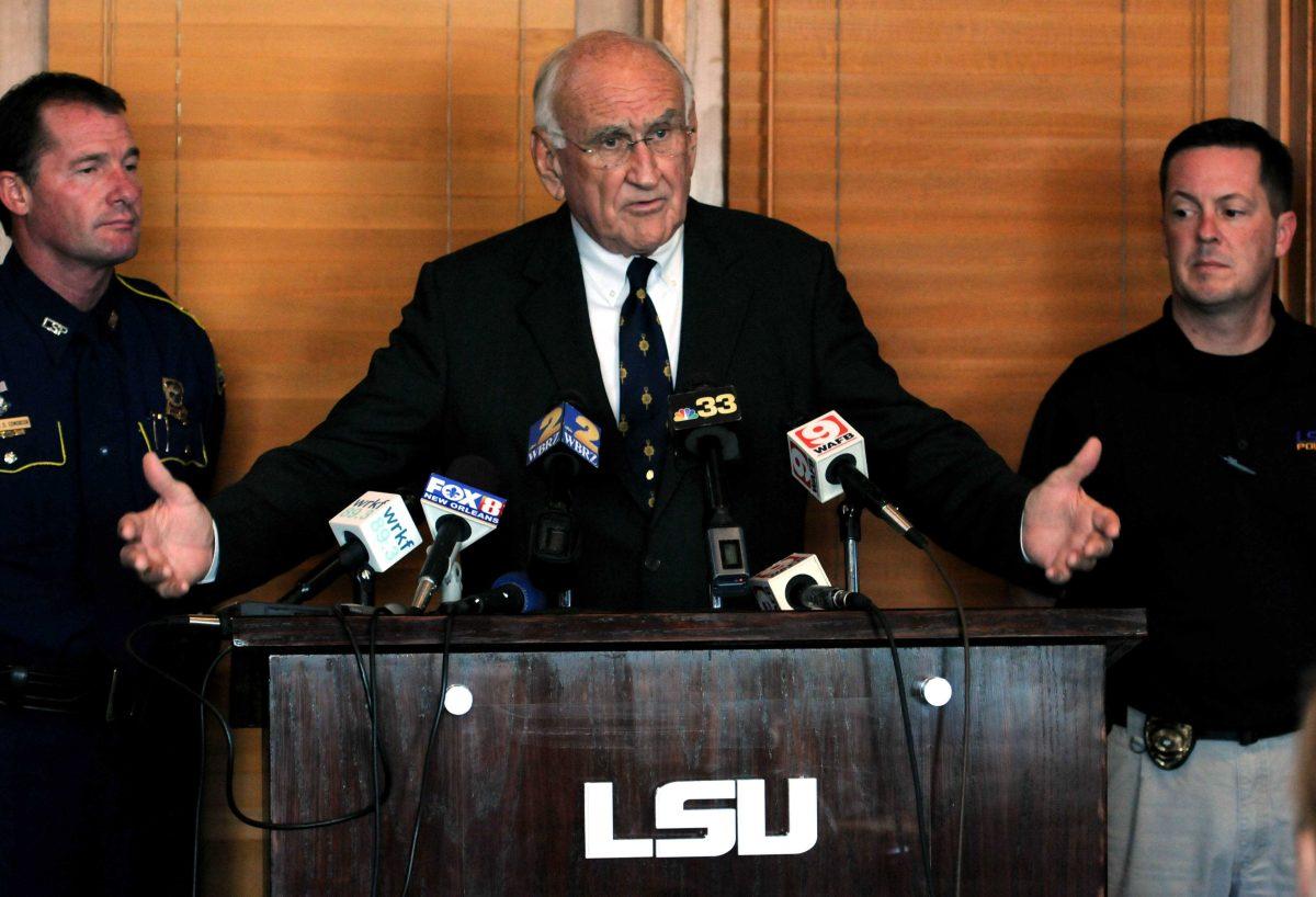 Catherine Threlkeld / The Daily Reveille LSU President William Jenkins, flanked by Louisiana State Police Superintendent Col. Michael Edmonson and LSU Police Department Corey Lalonde, speaks at a news conference about a bomb threat made to the school today, causing a campus-wide evacuation, in Baton Rouge, La., Monday, Sept. 17, 2012. (AP Photo/The Daily Reveille, Catherine Threlkeld)