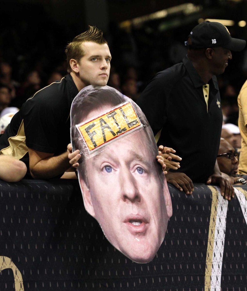 A Saints fan holds an image of NFL commissioner Roger Goodell in Sunday&#8217;s game against the Washington Redskins at the Mercedes-Benz Superdome. The Saints lost, 40-32.