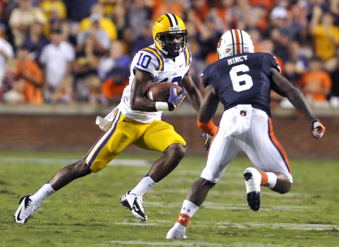 LSU senior wide receiver Russell Shepard (10) attempts to make his way around Auburn sophomore defensive back Jonathon Mincy (6) during the Tigers' 12-10 victory over Auburn on Saturday Sept. 22, 2012 in Jordan-Hare Stadium.
 