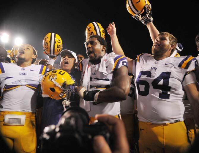 LSU football coach Les Miles sings the Alma Mater with players Saturday, Sept. 8, 2012 after the Tigers' 41-3 win over the University of Washington Huskies in Tiger Stadium.
 