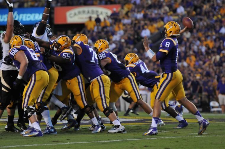 LSU junior quarterback Zach Mettenberger
 
throws a pass in the Tigers&#8217; victory against
 
North Texas on Sept. 1 in Tiger Stadium.
 