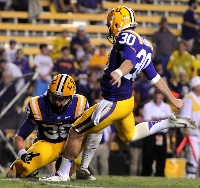 Sloppy LSU trudges past Towson, 38-22