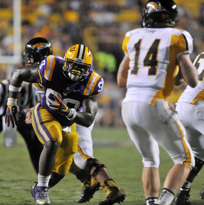 Sloppy LSU trudges past Towson, 38-22