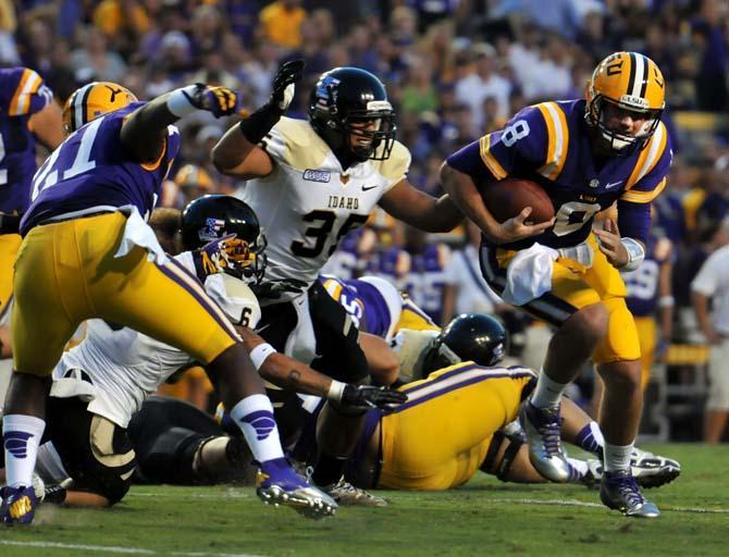 Junior quarterback Zach Mettenberger (8) runs the ball downfield Saturday, September 15, 2012 during the Tigers' 63-14 win over Idaho in Tiger Stadium.
 