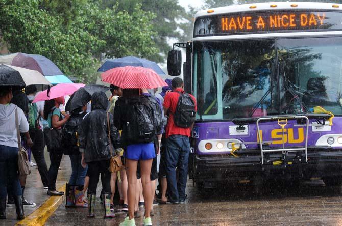 LSU students wait for buses to take them off campus Monday, Sept. 17, 2012 after a bomb scare.
 