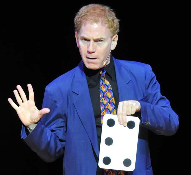 Mathemagician Bradley Fields performs in the Union Theater on Wednesday night. He uses magic tricks to teach his audience about mathematics.
 