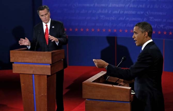 President Barack Obama and Republican presidential nominee Mitt Romney participate in the first presidential debate at the University of Denver, Wednesday, Oct. 3, 2012, in Denver. (AP Photo/Pool, Rick Wilking)
 