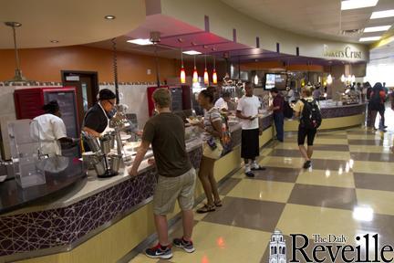 Students are served food at The 5 Dining Hall.