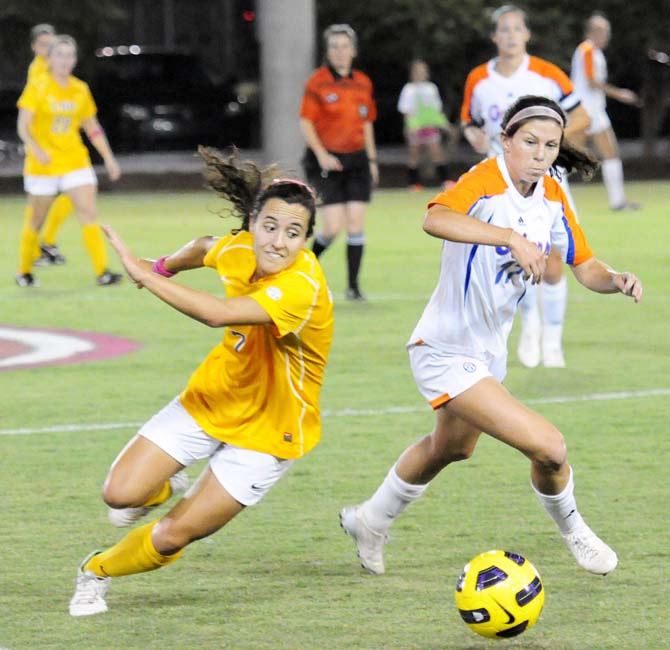 Freshman midfielder Fernanda Pina, 7, (i don't know how to make an enyay or spell it) and University of Florida senior midfielder Erika Tymrak, 17, fight for the ball Friday, Oct. 5, 2012 at the LSU Soccer Stadium. The Gators defeated the Tigers 2-0.
 