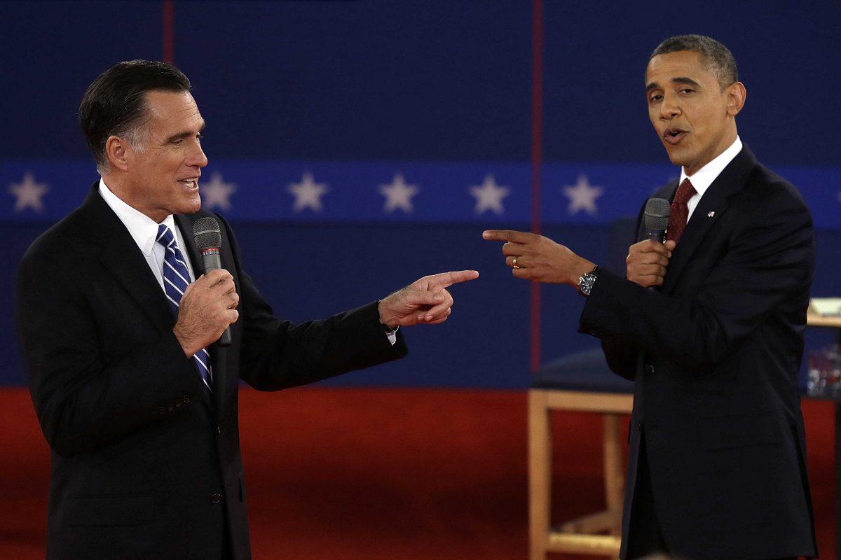 Republican presidential nominee Mitt Romney and President Barack Obama spar during the second presidential debate at Hofstra University, Tuesday, Oct. 16, 2012, in Hempstead, N.Y. (AP Photo/Charlie Neibergall)