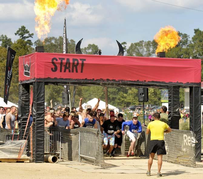 Runners face fire, mud and walls in 5k Warrior Dash