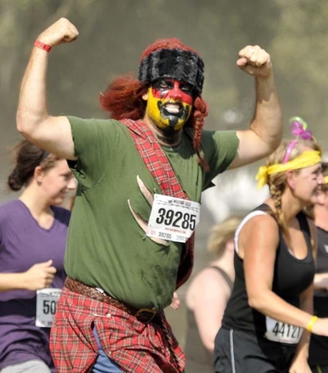 Runners face fire, mud and walls in 5k Warrior Dash