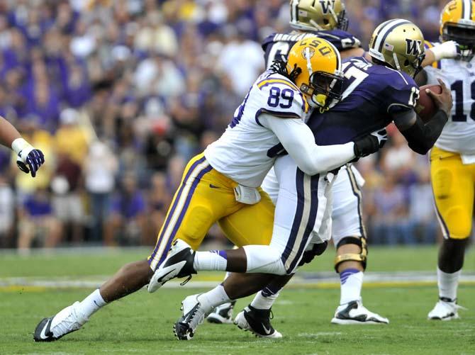 LSU senior defensive end Lavar Edwards (89) sacks Washington junior quarterback Keith Price (17) on Saturday Sept. 8, 2012 during the Tigers' 41-3 victory over the Huskies in Tiger Stadium.