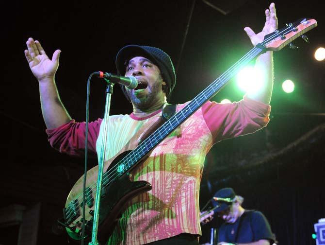 Victor Wooten sings into his microphone Wednesday night at the Howlin' Wolf music venue in New Orleans.
 