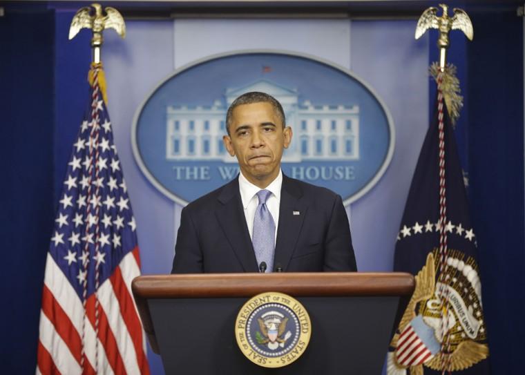 President Barack Obama pauses as he speaks in the White House Briefing Room in Washington, Monday, Oct. 29, 2012, after returning to the White House from a campaign stop in Florida to monitor Hurricane Sandy. (AP Photo/Pablo Martinez Monsivais)
 