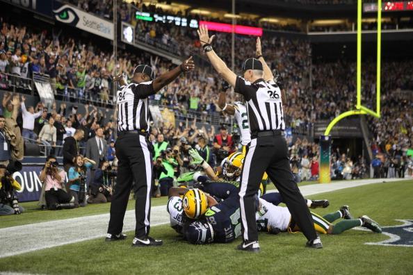 <p>SEATTLE, WA - SEPTEMBER 24: Wide receiver Golden Tate #81 of the Seattle Seahawks makes a catch in the end zone to defeat the Green Bay Packers on a controversial call by the officials at CenturyLink Field on September 24, 2012 in Seattle, Washington. (Photo by Otto Greule Jr/Getty Images)</p>