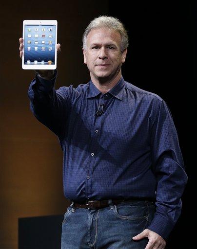 Phil Schiller, Apple's senior vice president of worldwide product marketing, introduces the iPad Mini in San Jose, Calif., Tuesday, Oct. 23, 2012. (AP Photo/Marcio Jose Sanchez)
 