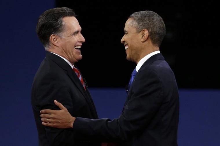 Republican presidential nominee Mitt Romney and President Barack Obama shake hands after the third presidential debate at Lynn University, Monday, Oct. 22, 2012, in Boca Raton, Fla. (AP Photo/Charlie Neibergall)
 