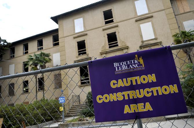 A purple and gold sign warns bypassers Tuesday, Oct. 16, 2012, of the construction currently happening at Annie Boyd Hall.
 