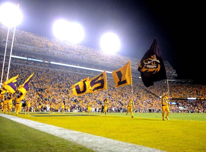 LSU cheerleaders celebrate the Tigers' second touchdown Saturday, Oct. 13, 2012 during the Tigers' 23-21 win against South Carolina in Tiger Stadium.
 