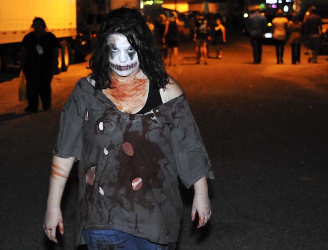 Performers creep around in the entrance of House Of Shock Saturday, Oct. 6, 2012 in New Orleans.
 