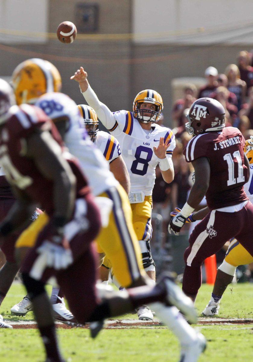 LSU quarterback Zach Mettenberger (8) throws against Texas A&amp;M during the first half of their NCAA college football game, Saturday, Oct. 20, 2012, in College Station, Texas. (AP Photo/Eric Kayne)